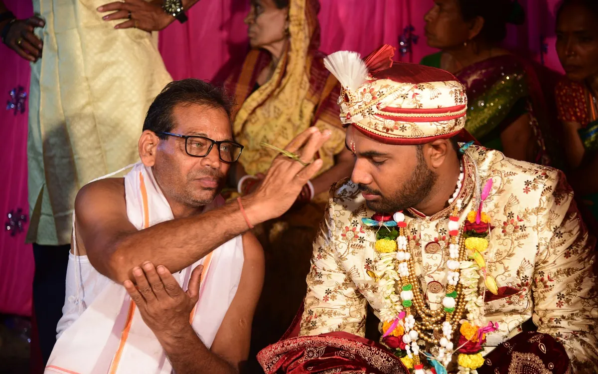 Family blessing at a Goswami ceremony