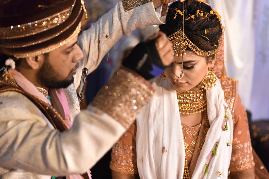 An Indian bride and groom — guna milan is completed before a marriage is fixed