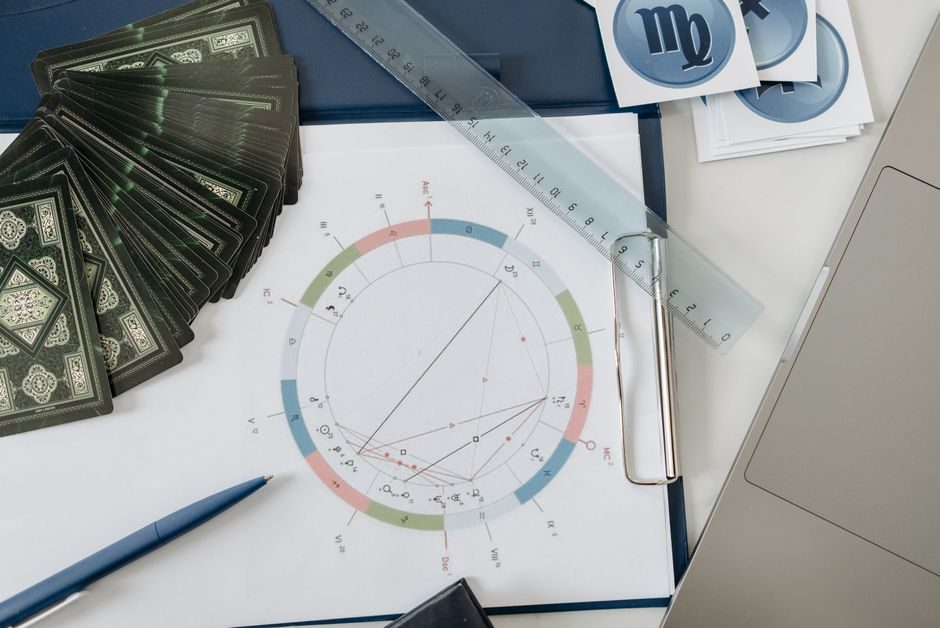 An astrologer reviewing a birth chart to assess Manglik dosha
