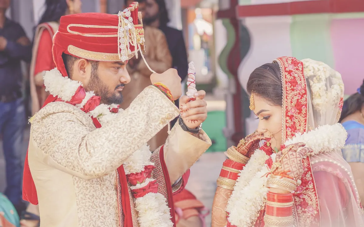 A couple in a Hindu wedding ritual