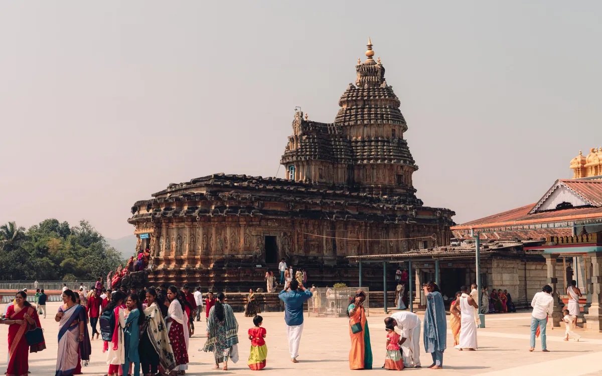 An Indian family visiting a historic Hindu temple together