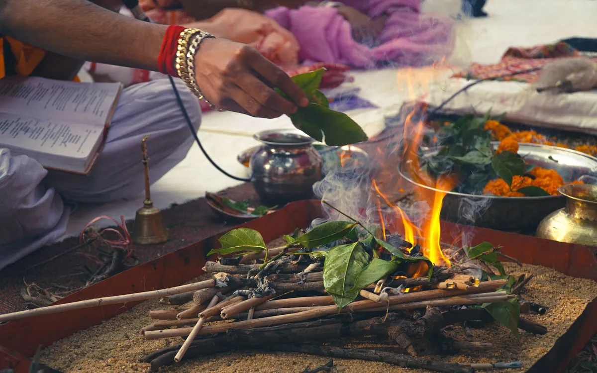 Offerings placed in a sacred fire during a Hindu havan ritual